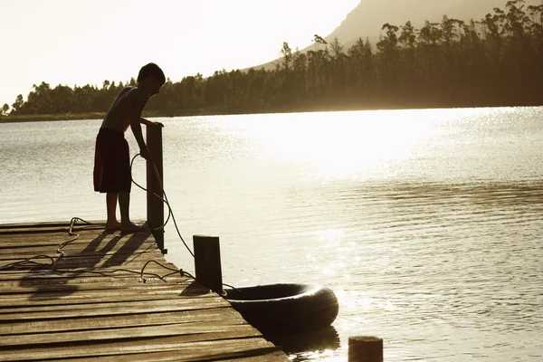 Boy Pulling in Float Tube — Stock Photo, Image