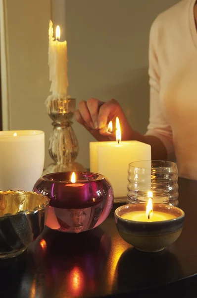 Woman Lighting Candles — Stock Photo, Image