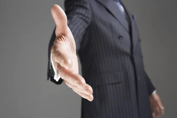 Businessman Offering Hand — Stock Photo, Image