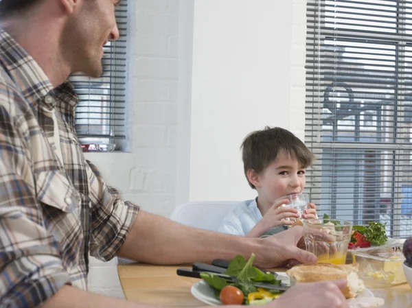Father and Son at Dinner Table — Stock Photo, Image