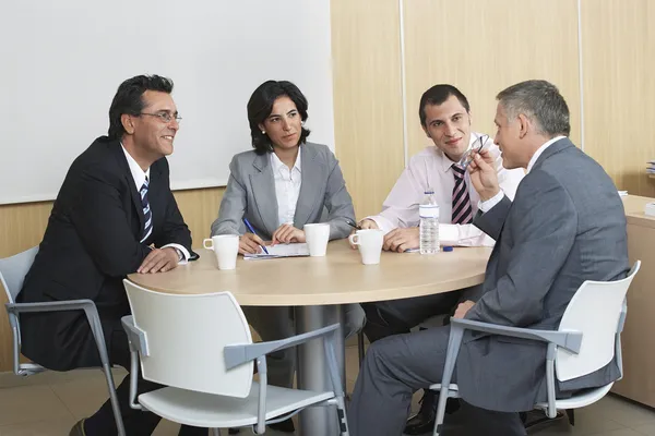 Businesspeople having meeting in office — Stock Photo, Image