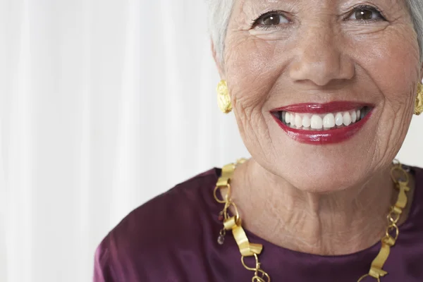 Senior woman smiling — Stock Photo, Image