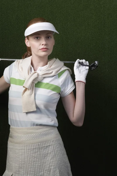 Female golfer with  golf club — Stock Photo, Image