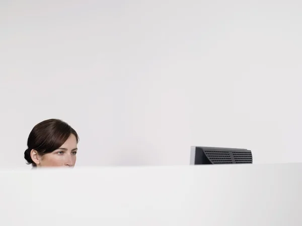 Office worker in cubicle — Stock Photo, Image