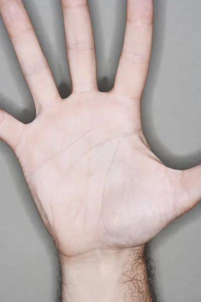 Man visar utsträckta hand — Stockfoto