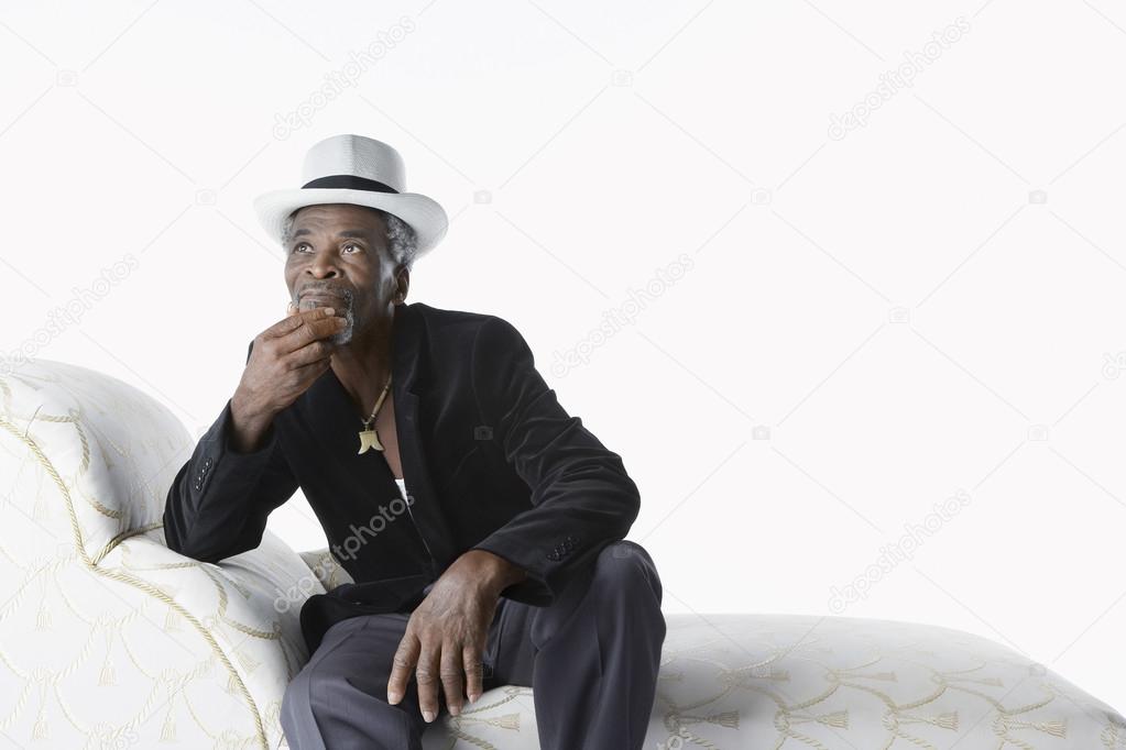 African Man on Chaise Lounge