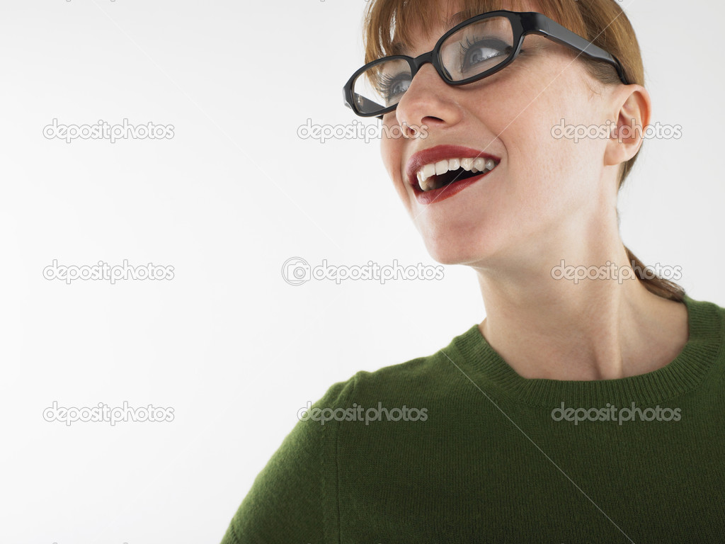 Woman in studio wearing glasses
