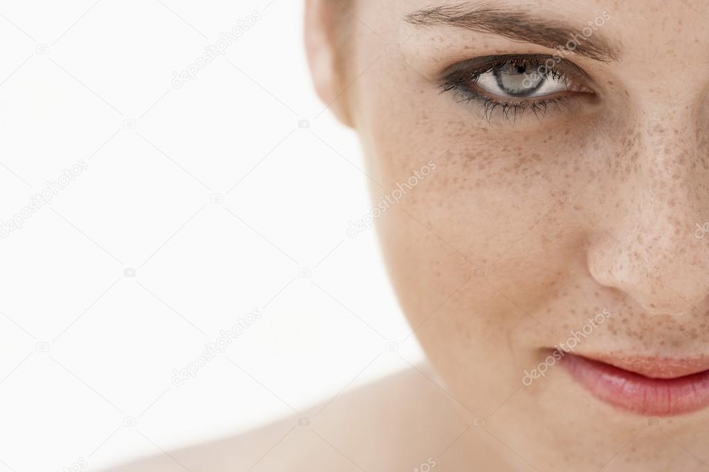 Young woman with freckles