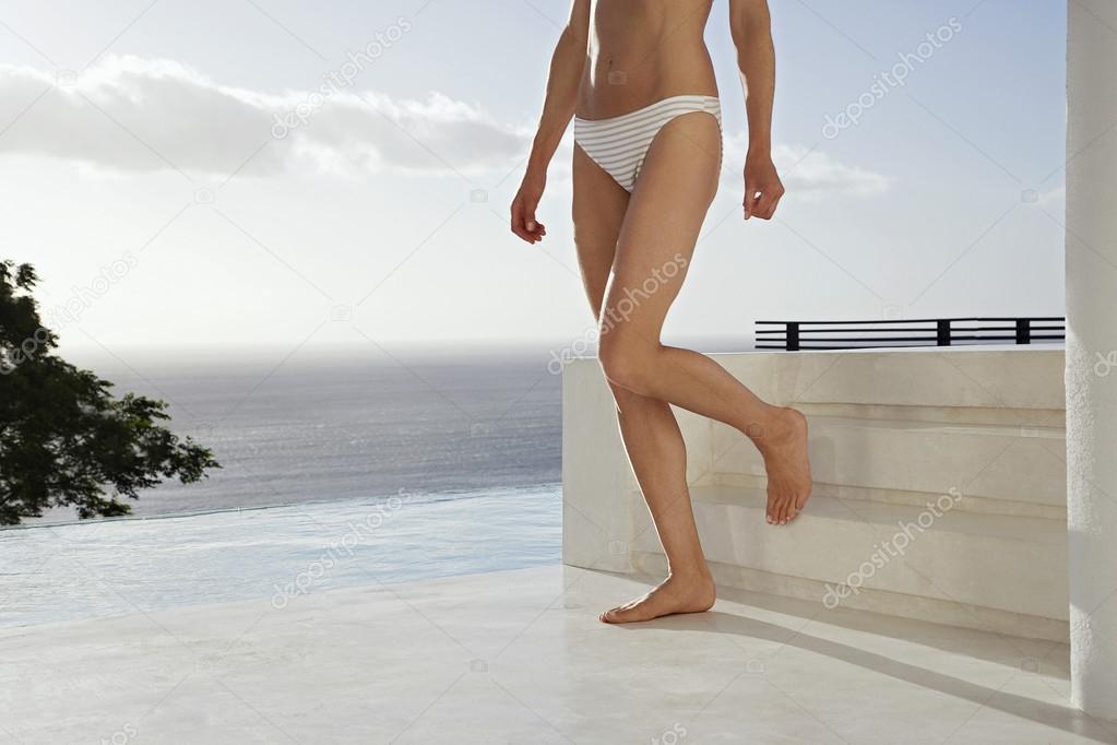 Woman walking  on terrace