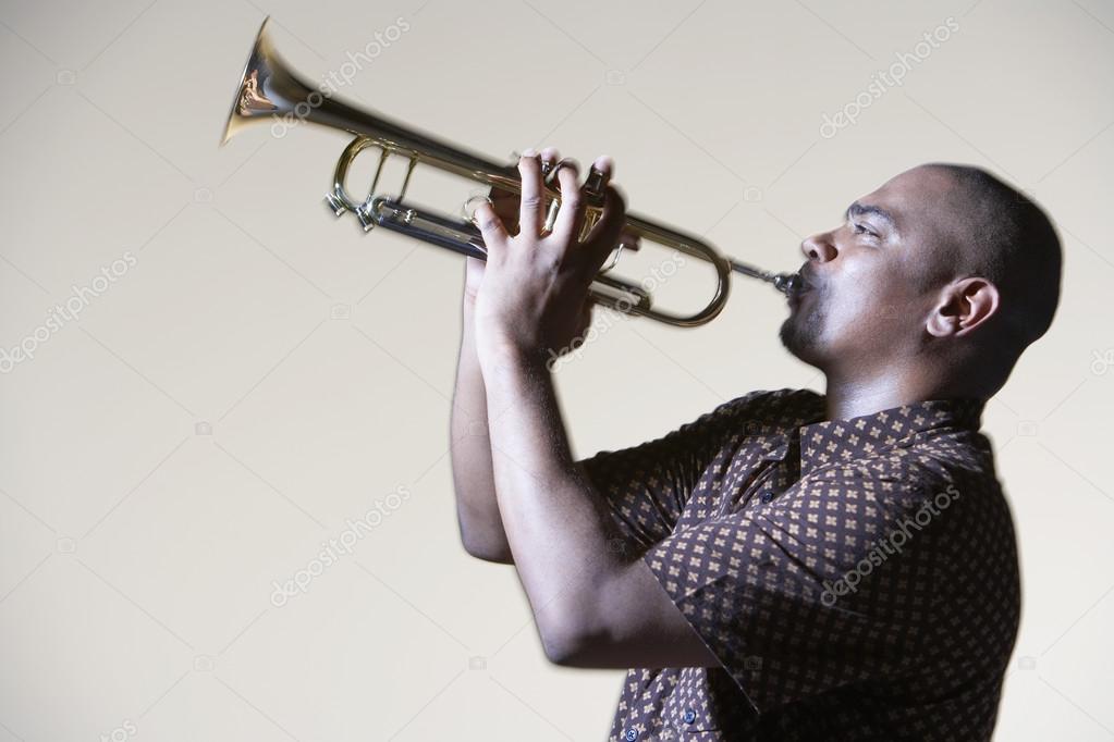 Man Playing Trumpet Stock Photo by ©londondeposit 33831915