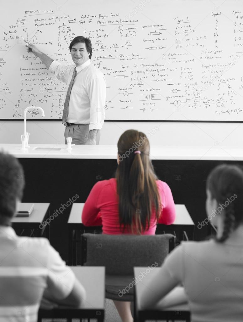 Teacher teaching on whiteboard