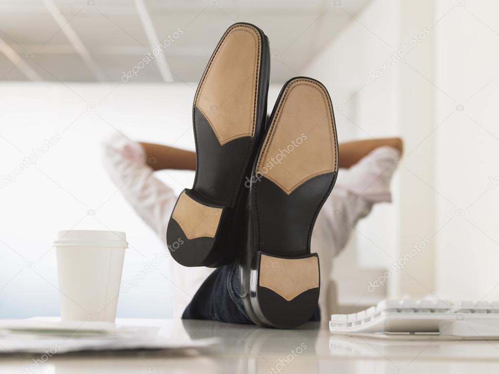 Businessman with Feet Up