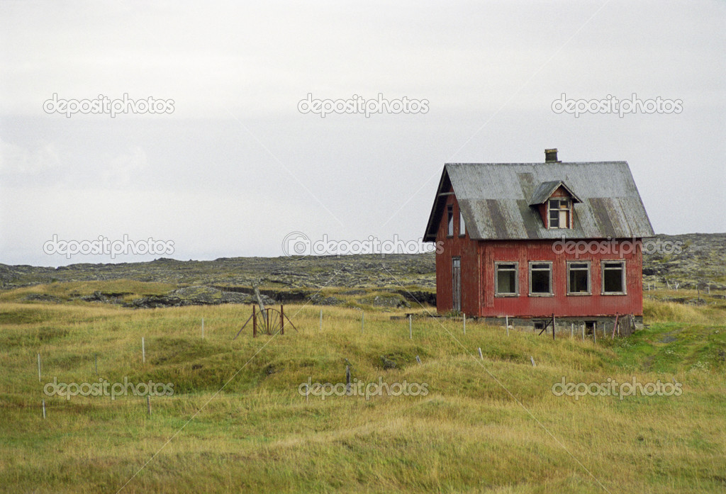 Old house in rugged landscape