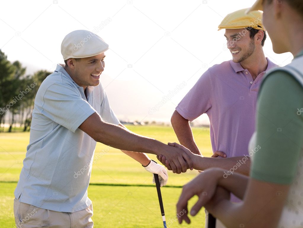  Golfers Shaking Hands