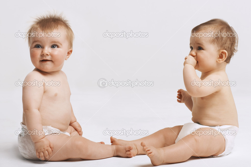 Two Babies looking away