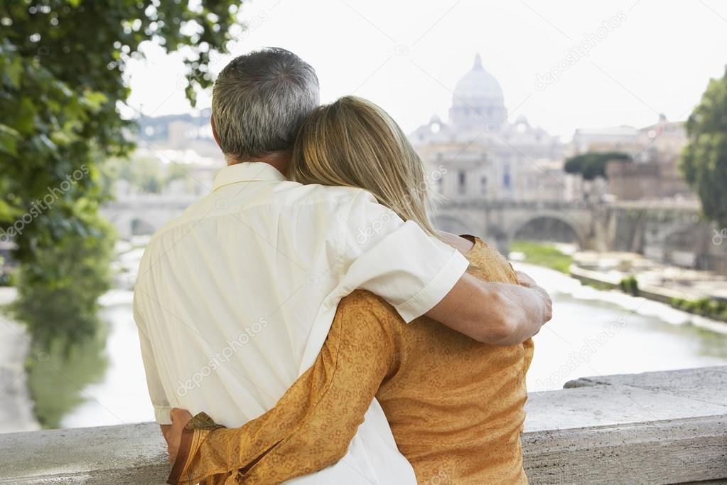 Couple looking at view of cathedral