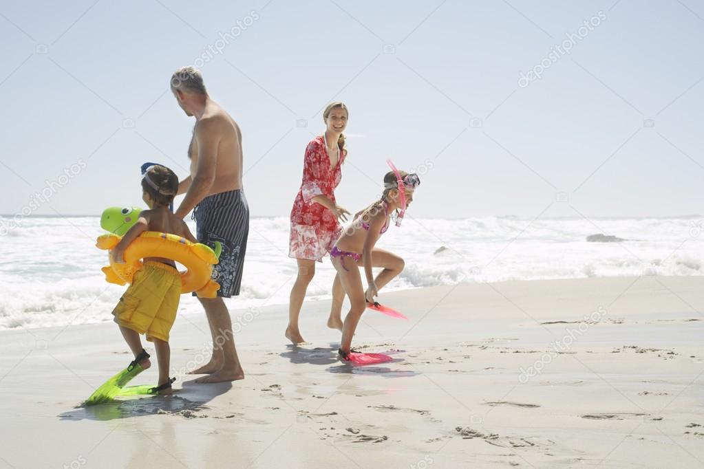 Family Playing on Beach