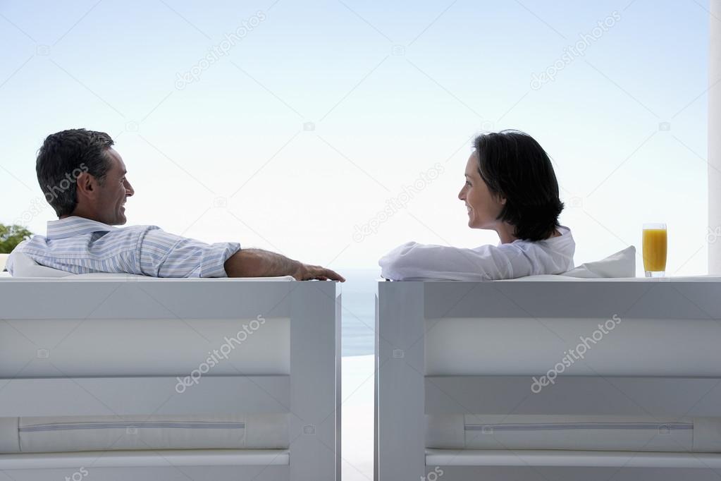 Couple Sitting at Beach