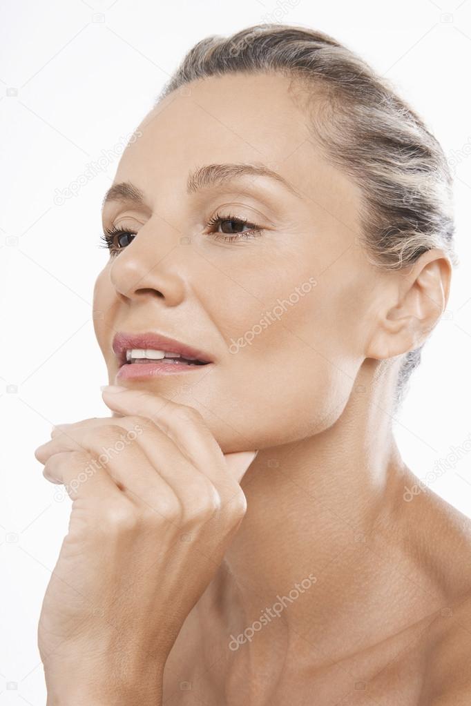 Middle-Aged Woman hand on chin