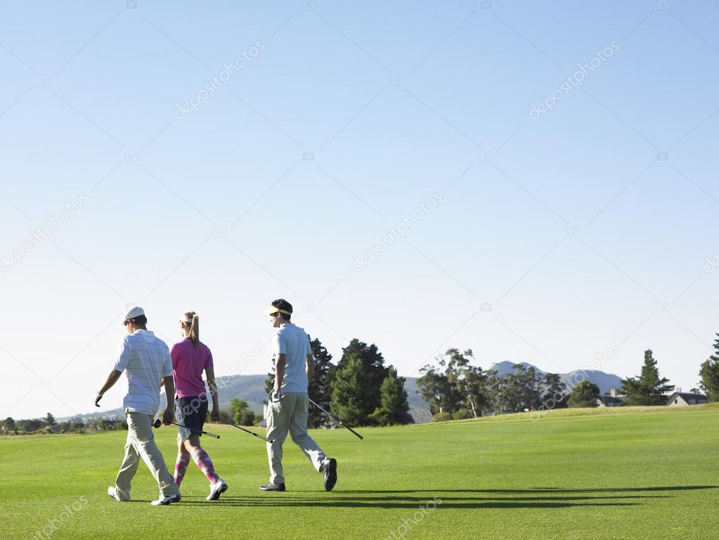 Golfers on Course