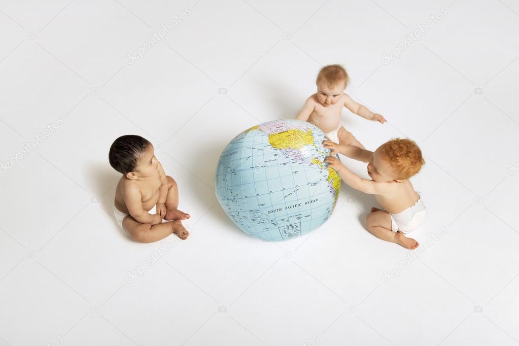 Babies Playing With Globe