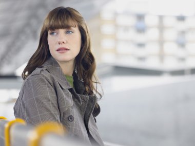Businesswoman Waiting for a Train