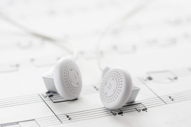 Sheet Music and Headphones clipart