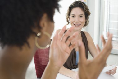 businesswomen during meeting clipart