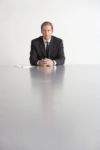 Businessman Sitting in Conference Room — Stock Photo, Image