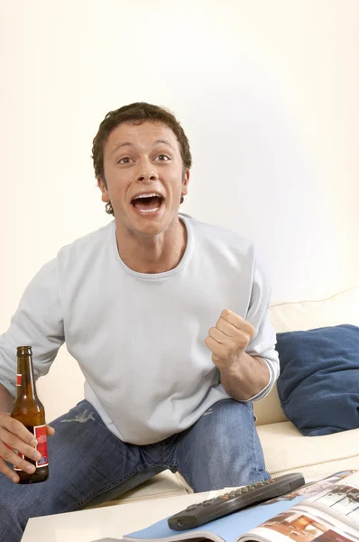 Man Watching Television and Cheering — Stock Photo, Image