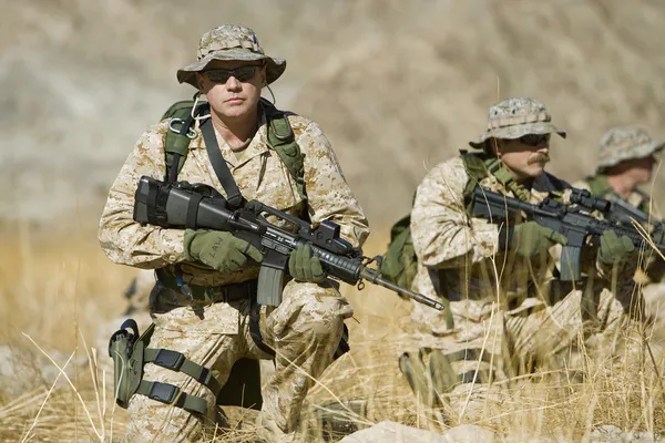 Soldiers with rifles — Stock Photo, Image