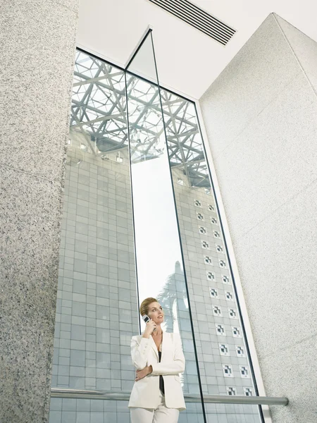 Businesswoman using mobile phone — Stock Photo, Image