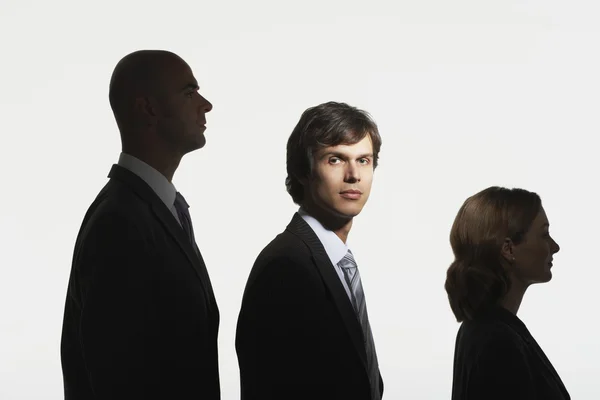 Businesspeople standing in row — Stock Photo, Image