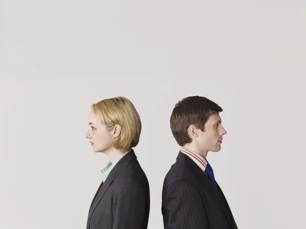 Business people standing back to back — Stock Photo, Image