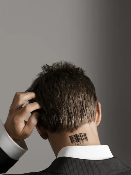 Man with bar code on neck back — Stock Photo, Image