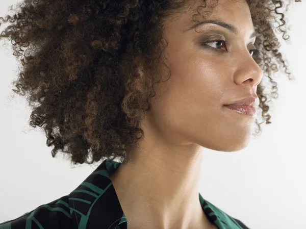 Mujer con el pelo rizado — Foto de Stock