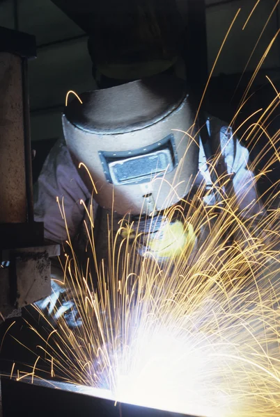Welder wearing protective face mask — Stock Photo, Image