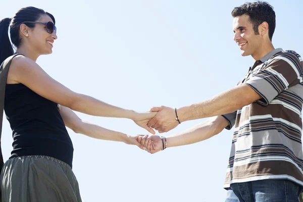 Couple holding hands — Stock Photo, Image