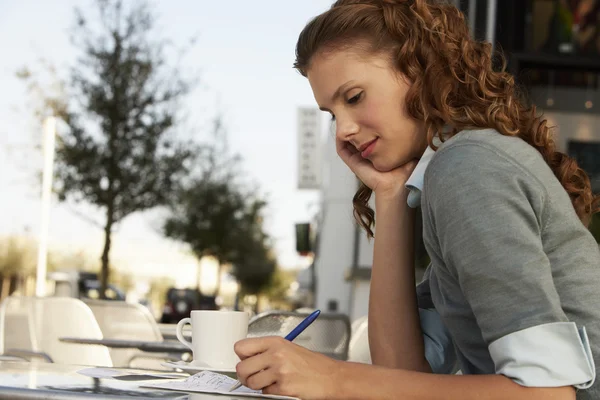 Businesswoman writing — Stock Photo, Image