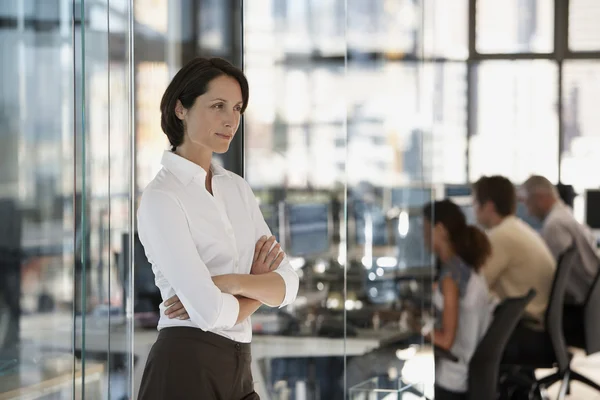 Businesswoman with group of office workers — Stock Photo, Image