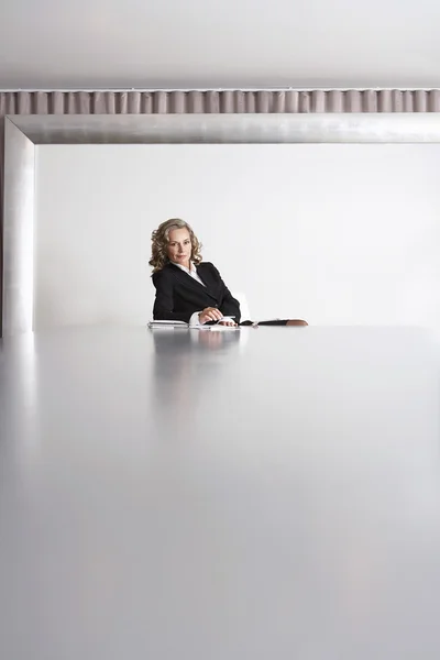 Business Executive Sitting in Boardroom — Stock Photo, Image