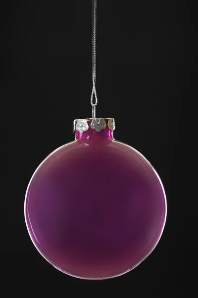 Purple Christmas bauble Stock Photo