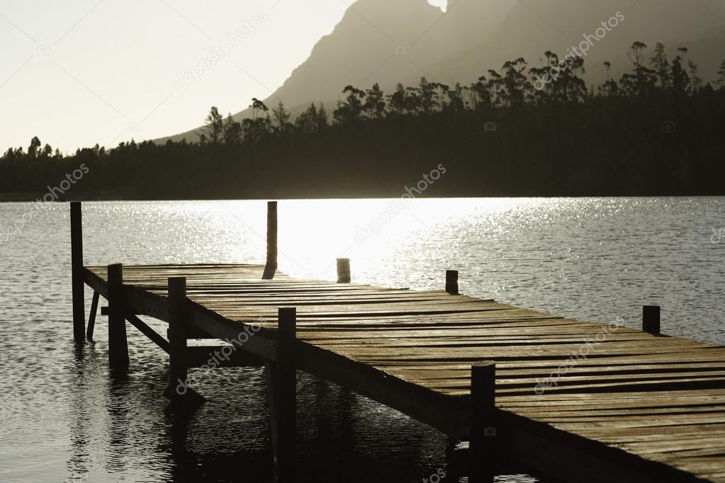 Wooden dock on lake.