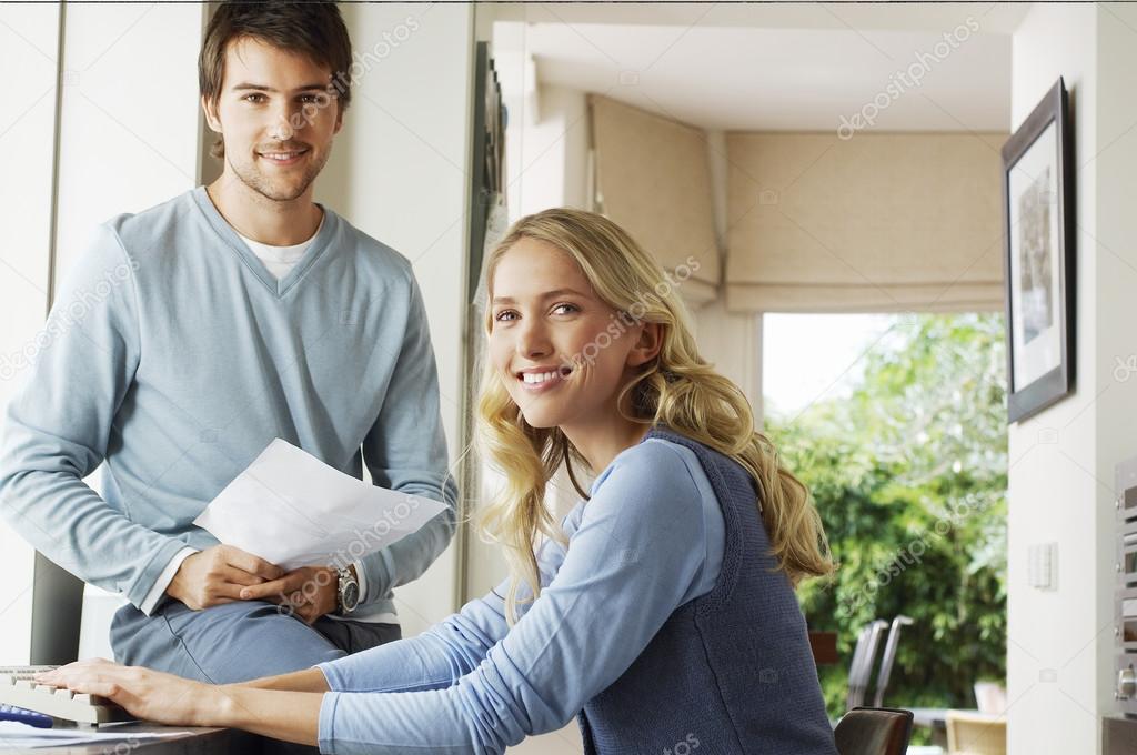 Couple Looking at Document