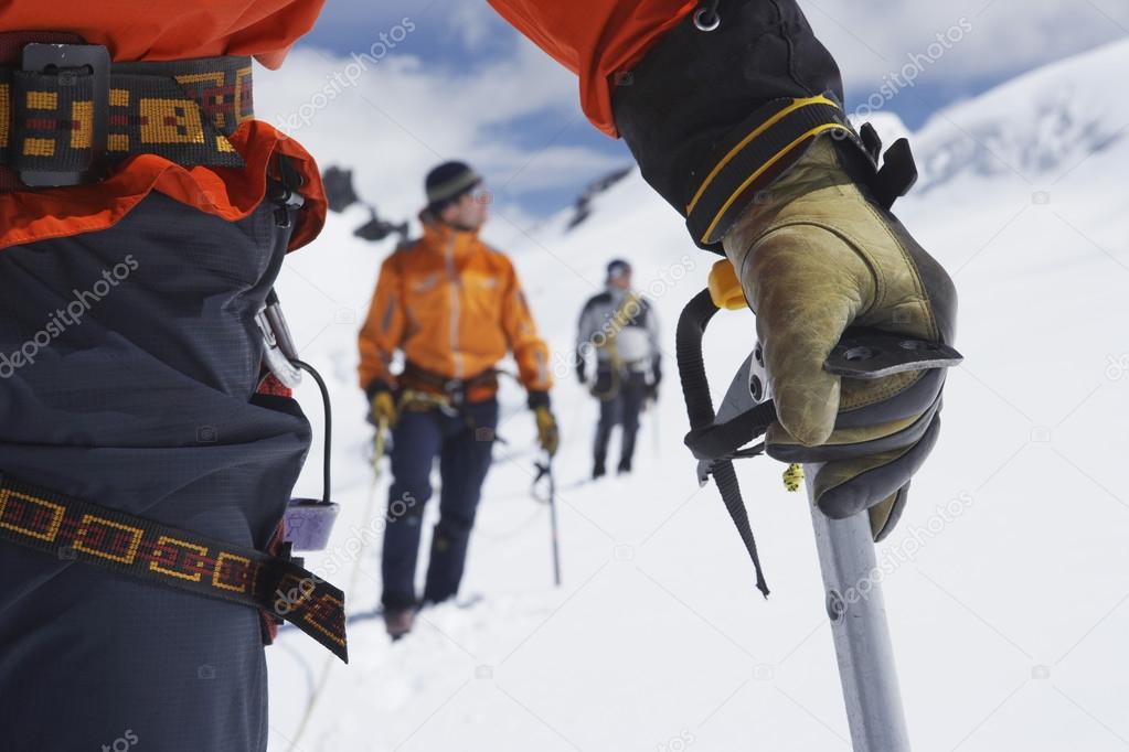 Hikers using walking sticks