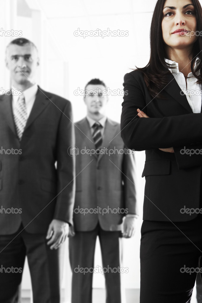 Businesswoman with male colleagues