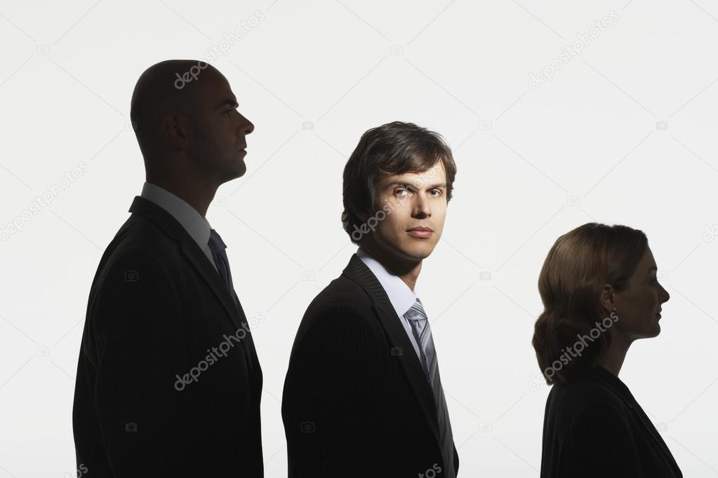 Businesspeople standing in row