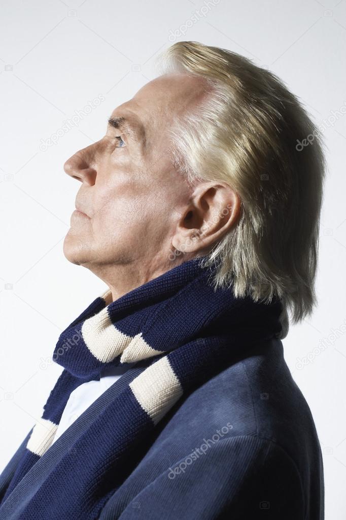 Man Wearing a Scarf looking up