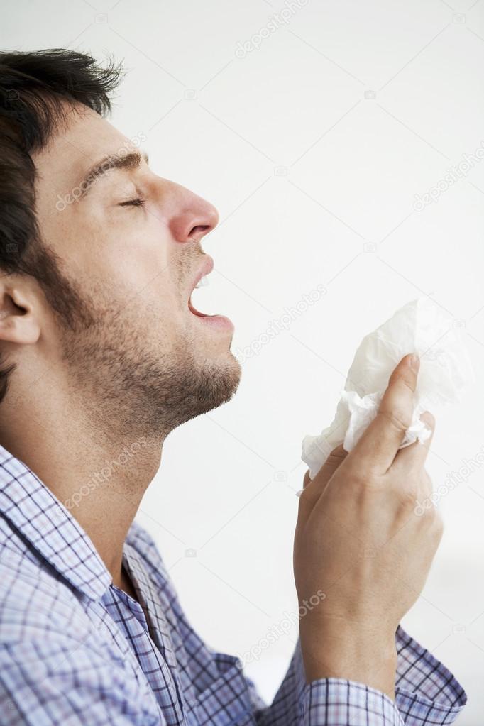 Man sneeze