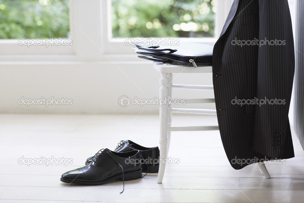 Clothing of businessman on chair